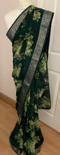 Load image into Gallery viewer, Floral print saree the colour is dark green 2103